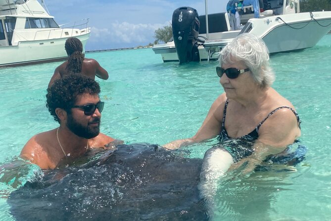 Stingray City and Snorkeling Private Charter - Snorkeling among fish and coral